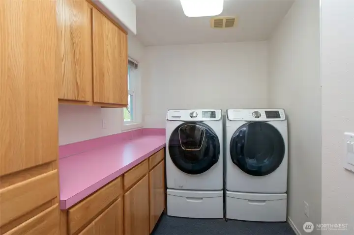 Great utility and storage in this dedicated room