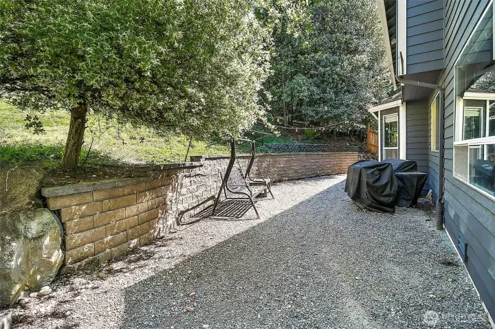 Shaded gravel area.