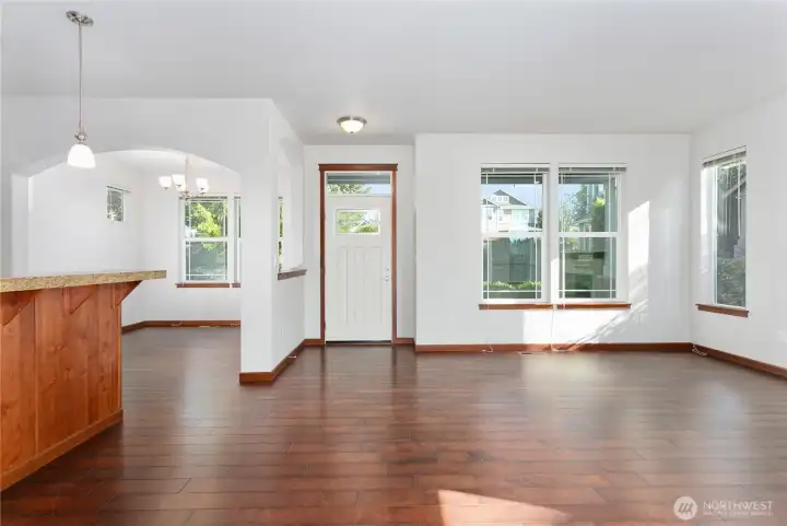 Open concept allows kitchen to see into living and dining room