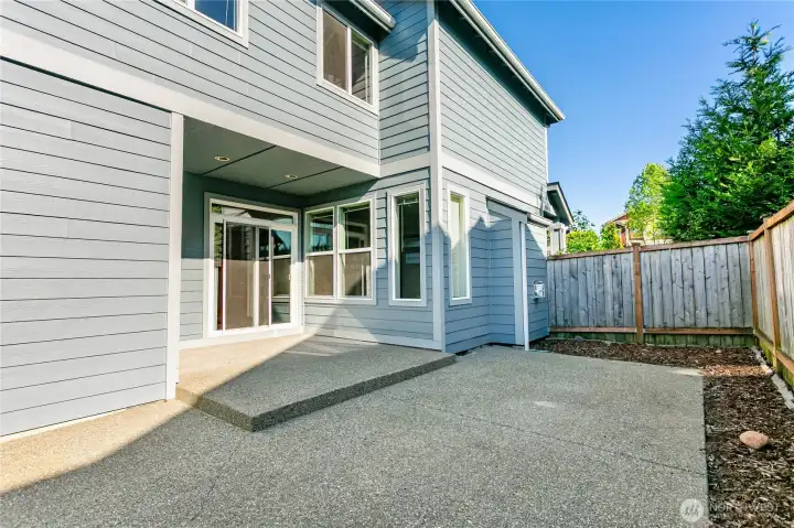 Fenced in, low-maintenance patio