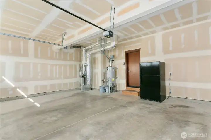 2-car garage, fridge conveys with sale!