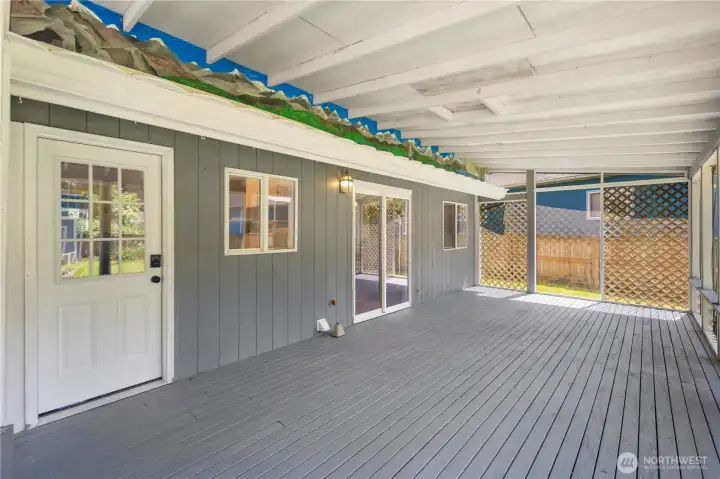 Imagine relaxing or having get togethers on this enclosed patio!