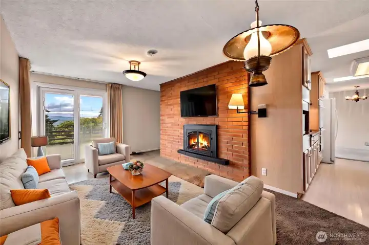Slider leads to Deck =Views . Gas fireplace - Home is Virtually Staged .
