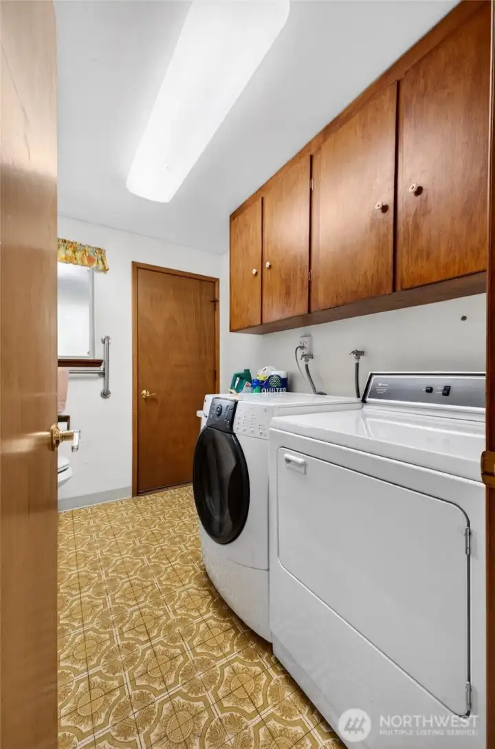Laundry & 1/2 Bath on the main level .
