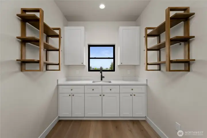 Back kitchen with sink and shelving