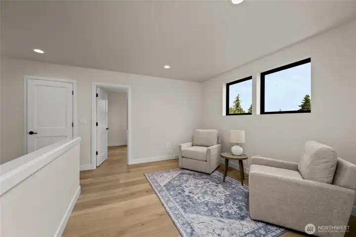Upstairs bonus family room at the top of the stairs