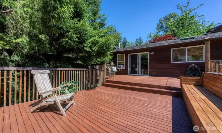 Spacious deck with built-in bench seating and room to create your ideal outdoor setup. Spacious deck with built-in bench seating and room to create your ideal outdoor setup.