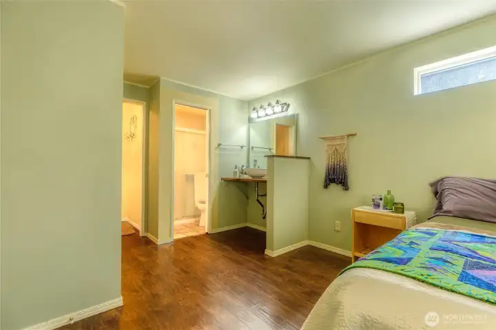 Primary w/convenient sink creates a functional area, while a separate door leads to shower room ~ offering added convenience for busy mornings and enhanced privacy. Door to left is your walk-in closet. Primary w/convenient sink creates a functional area, while a separate door leads to shower room ~ offering added convenience for busy mornings and enhanced privacy. Door to left is your walk-in closet.