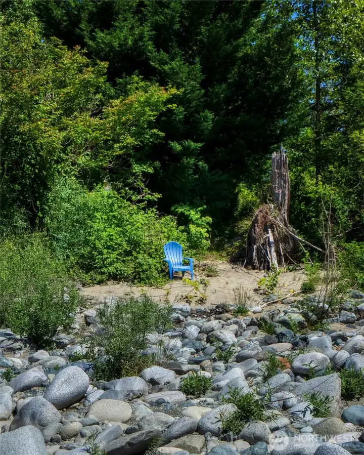 A short trail leads to your own sandy beach, where you can relax by the water and enjoy the peaceful sights & sounds of the river. A short trail leads to your own sandy beach, where you can relax by the water and enjoy the peaceful sights & sounds of the river.