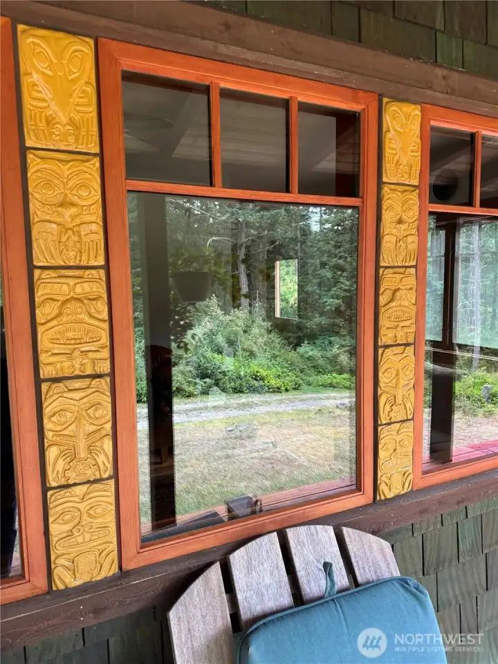 Living room windows look out towards the natural surroundings. Custom tiles made by Crow Valley Pottery Living room windows look out towards the natural surroundings. Custom tiles made by Crow Valley Pottery