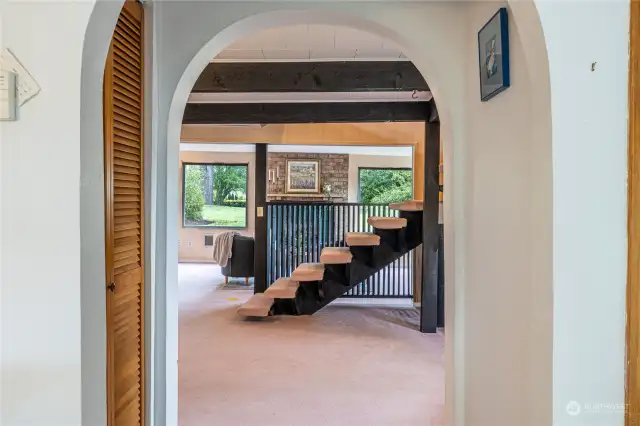 The passageway from the kitchen to the living/dining room creates separation but still maintains the open feel.