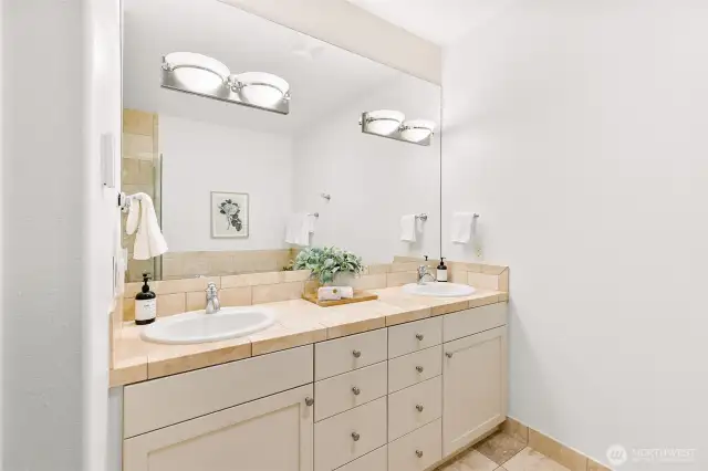 Primary bath with dual sinks.