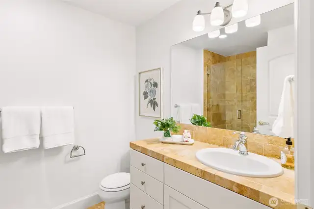 Spare bath with shower.