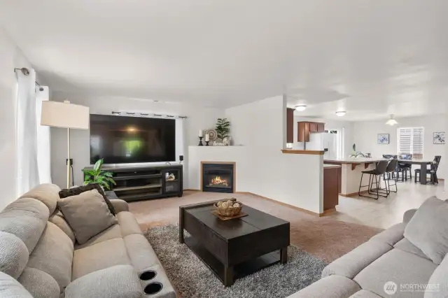 Another shot of the living room and kitchen