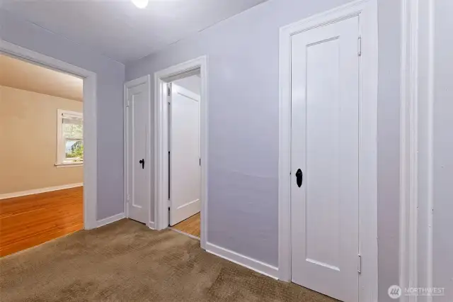 One linen closet and coat closet in hall.