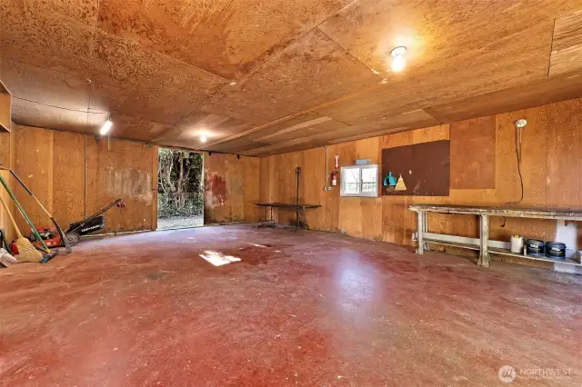 560 sq ft shop. Lots of attic storage.