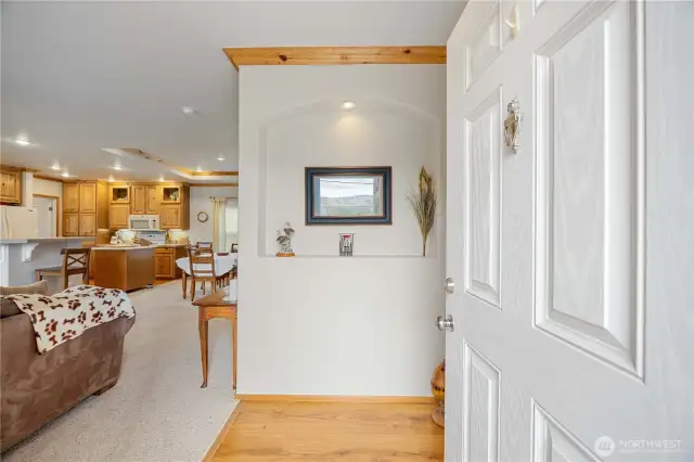 Front door entry opens into the cozy living room.