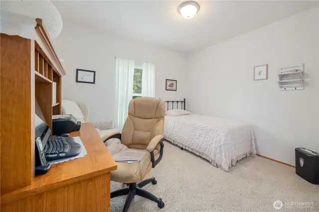 One of the  two guest bedrooms doubles as a home office.