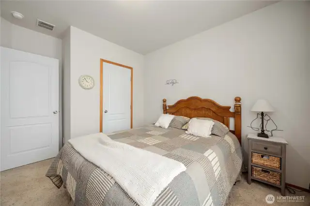 Hall door entry left of the bed for the 2nd guest bedroom.