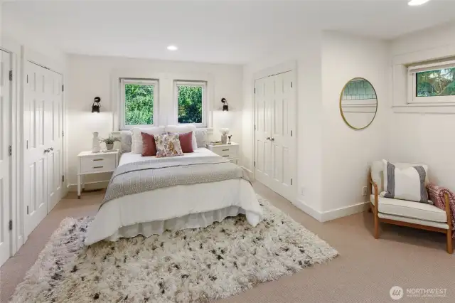 Primary bedroom with multiple, spacious closets