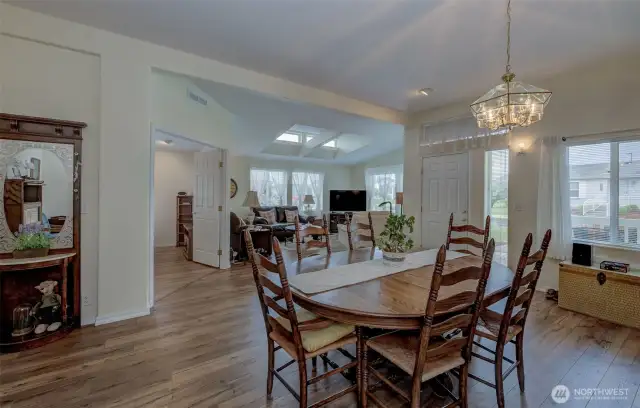 Front Entry flows into Dining Room, Living Room and Den!