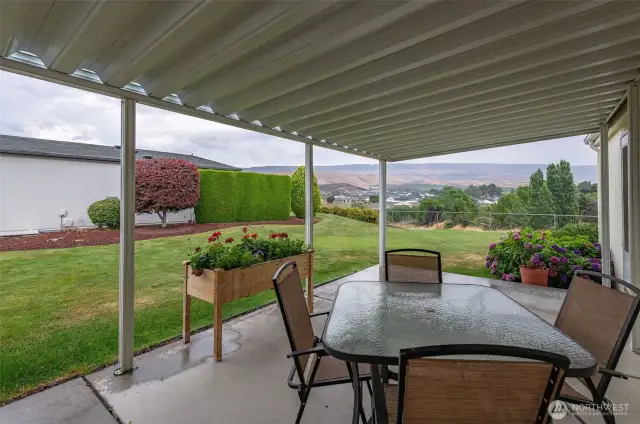 Your outdoor entertainment area overlooks the canyon and the foothill views beyond...