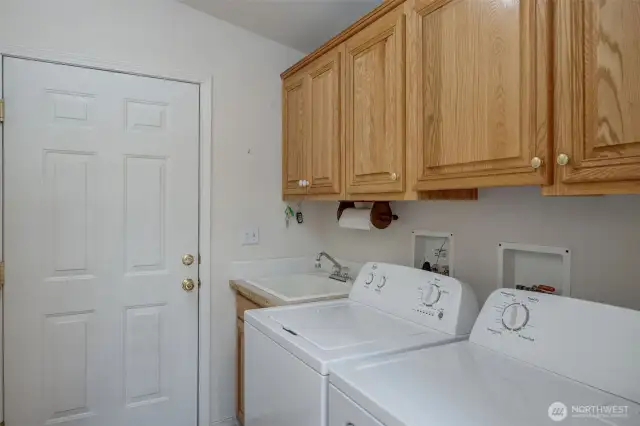 All appliances included! And NO STEPS into this oversized attached garage!