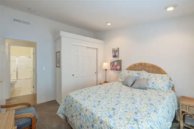 Looking toward 2nd Guest Bedroom closet and bathroom across the hall.
