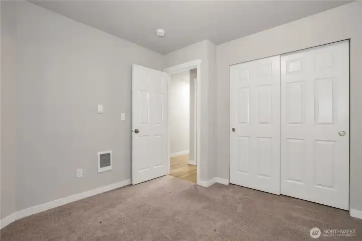Bedroom #1 with double door reach-in closet