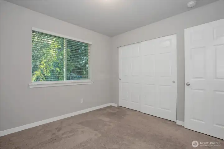 Bedroom #2 with double door reach-in closet