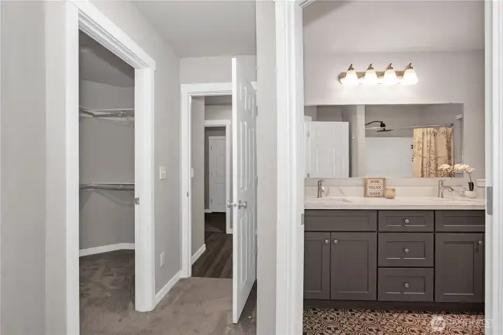 Primary Suite walk-in closet and Ensuite