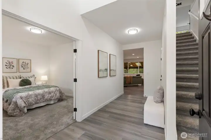 Main floor guest bedroom with attached ensuite.