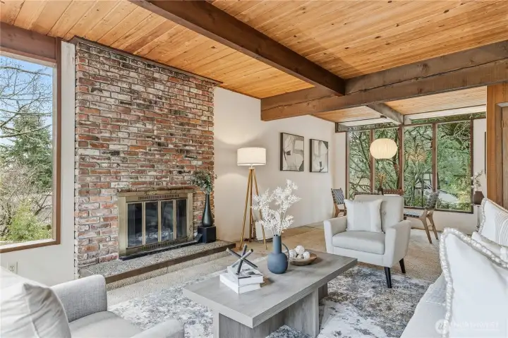 The living room features a wood burning fireplace.
