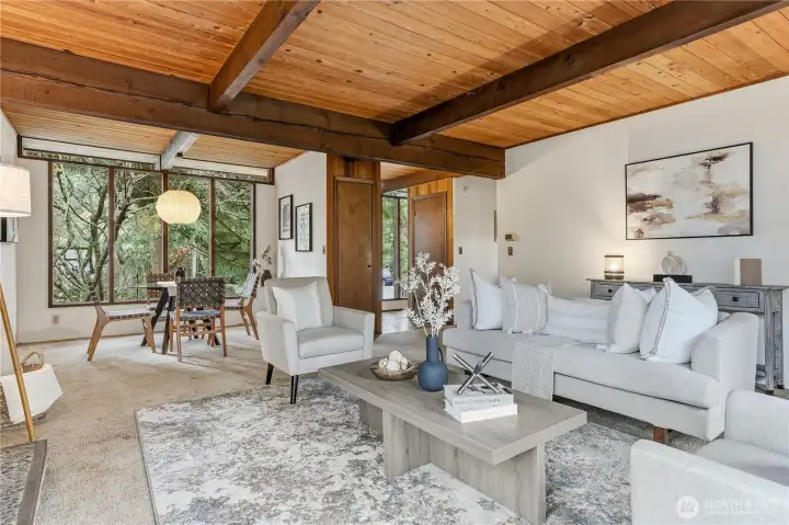 Another view of the living room looking toward the dining area and entry.