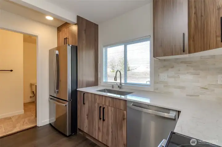 Brand new fridge and dishwasher staying!