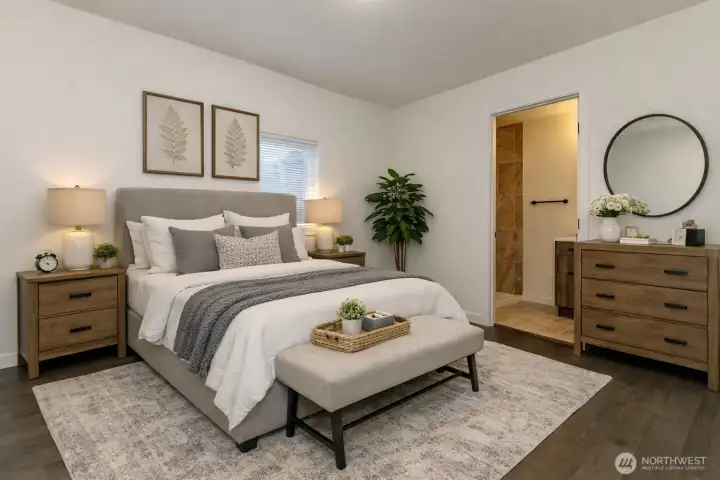 Virtually staged primary bedroom with walk in closet