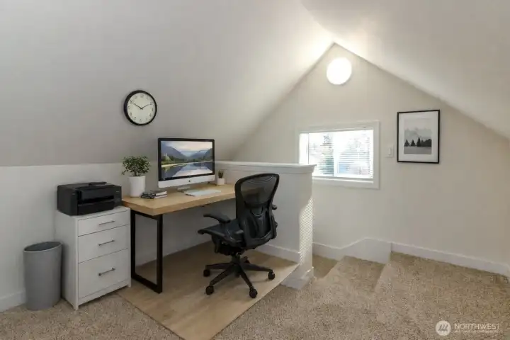 Upstairs loft area virtually staged as office space