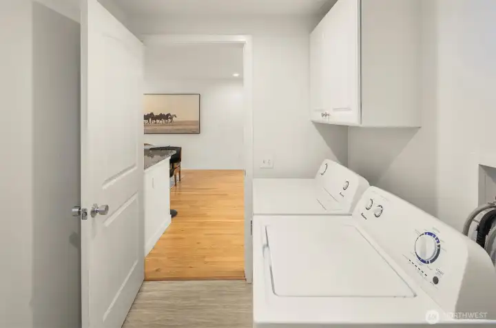 The utility room is a great size, housing your full sized washer/dryer and with space for storage.