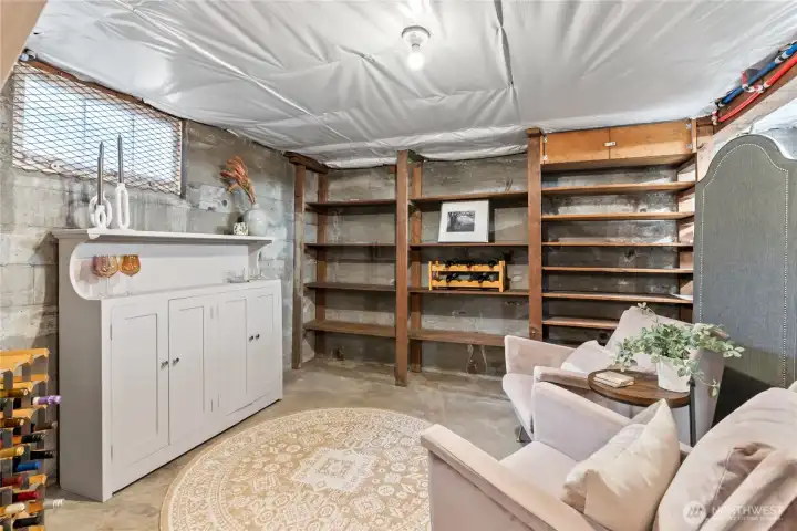 Lower floor ready to complete with your dream separate quarters, family room,so many possibilities. Separate door to exit. Excellent area on the opposite side for wine cellar.