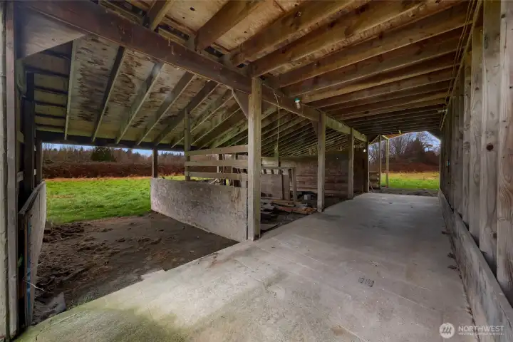West wing of the barn. Use for livestock, storage units, and more.