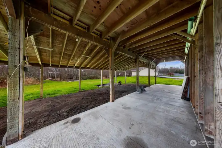East covered wing of the big red barn.