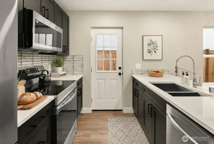 Luxury kitchen with custom cabinets, SS appliances and Quartz counters