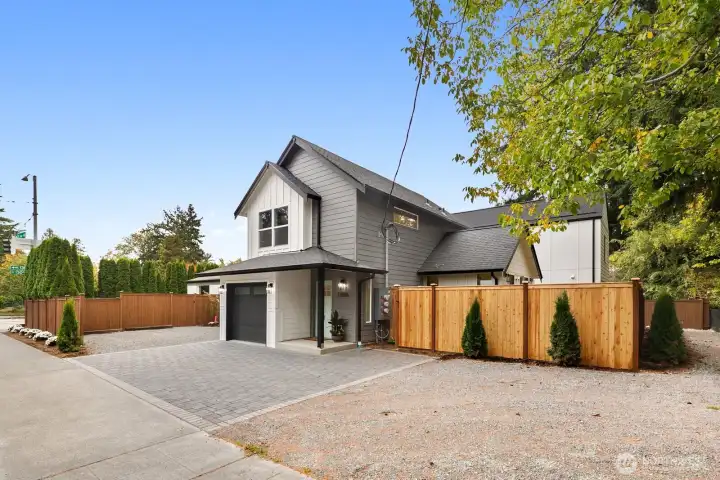 Nestled on a corner lot dedicated off street parking and custom paver driveway.