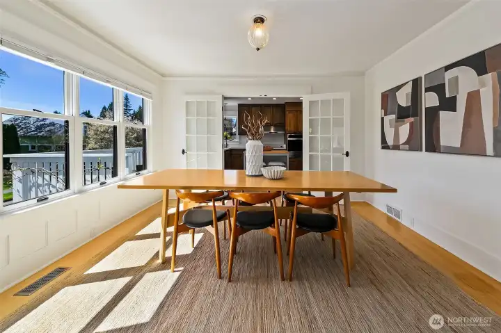 Another view of the dining room. This space easily fits a large group. Position the table by the window and add a buffet for even more storage.
