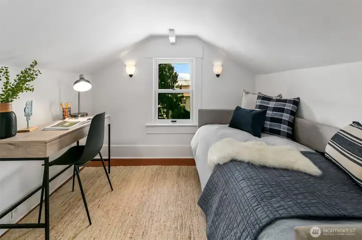 Upstairs den or small bedroom space. Lovely Southern views in this room.