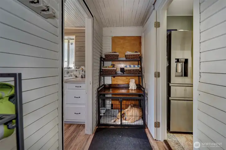 A small alcove for the pets, or an area to build out a pantry.