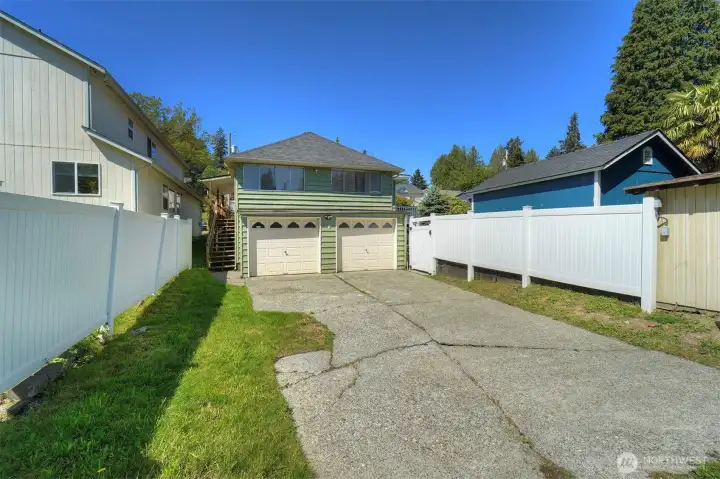 Not only do you have a two car garage, the back is gated with extra room for parking (along with street parking at the front).