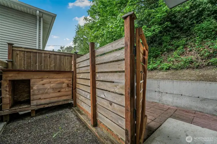 Fenced dog kennel