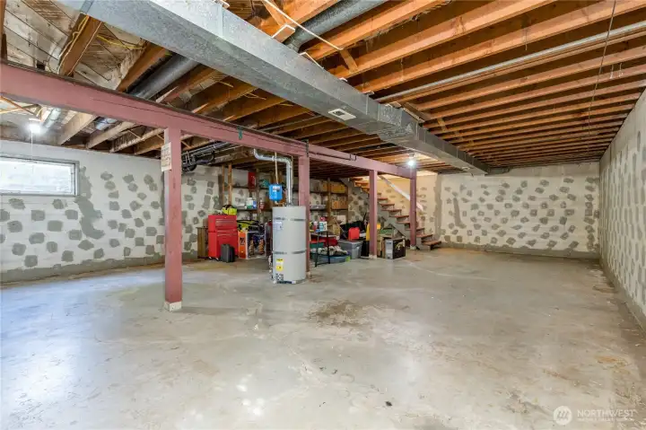 Massive Potential! The full unfinished basement is a blank canvas for a gym, media room, office space, or just extra storage.