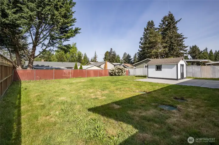 Fully-fenced yard, perfect for pets and play